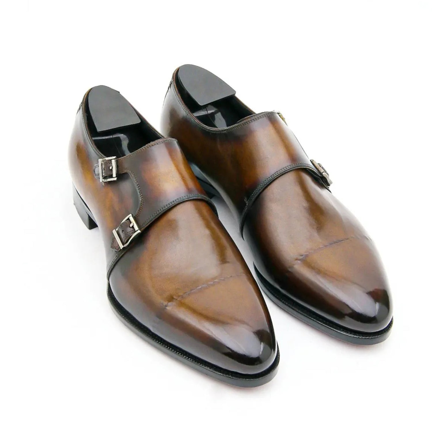 Luxury men's brown handcrafted genuine leather double monk strap dress shoes featuring a hand-painted patina finish, cap-toe design, polished silver buckles, cushioned insole, and premium formal styling for weddings, office wear, business meetings, and special occasions.