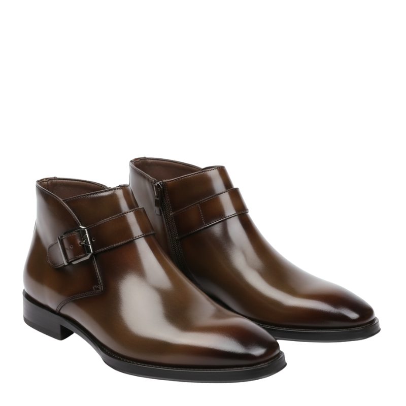 Men’s brown polished leather monk strap ankle boots with buckle detail.