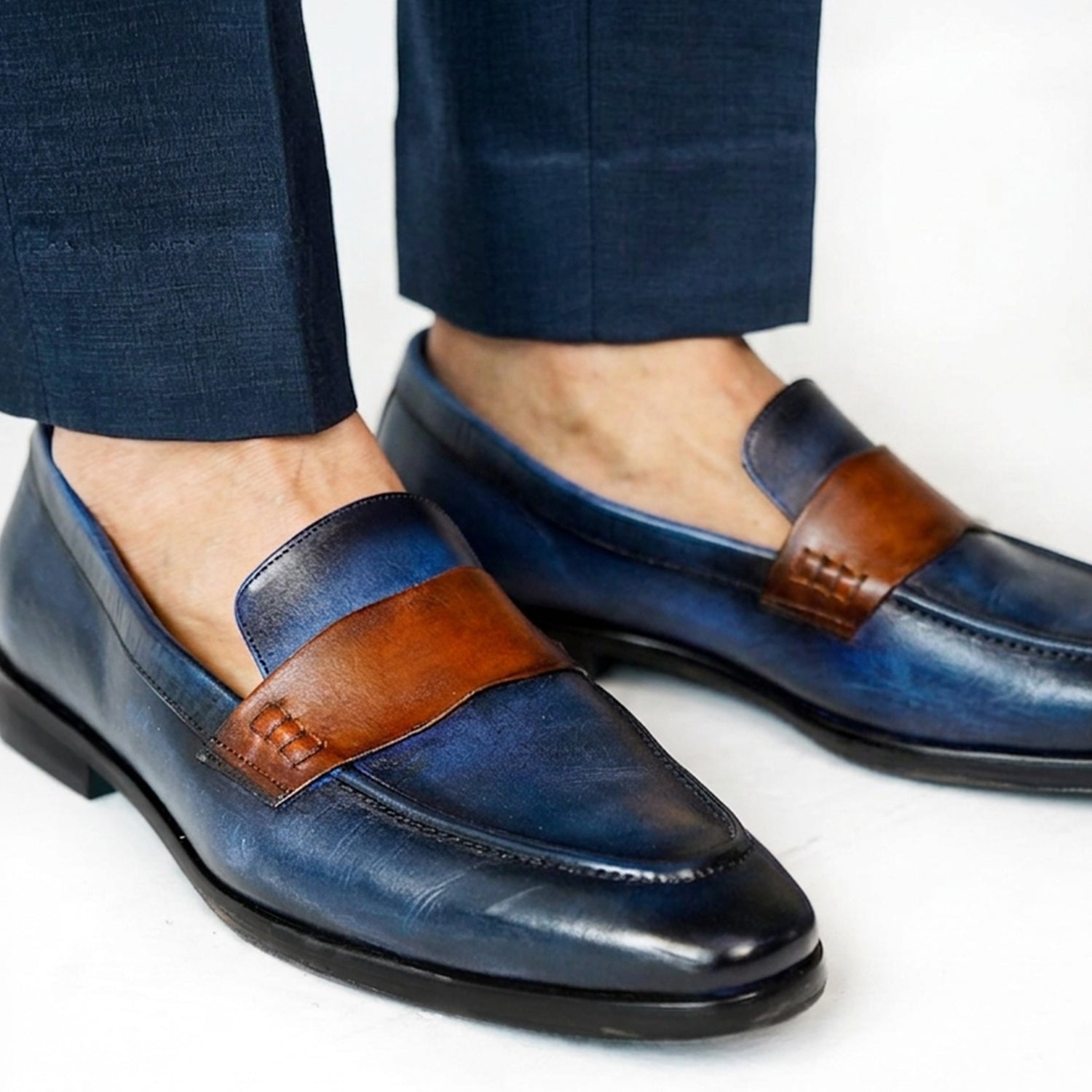 Two-Tone Leather Penny Loafers with Tailored Trousers