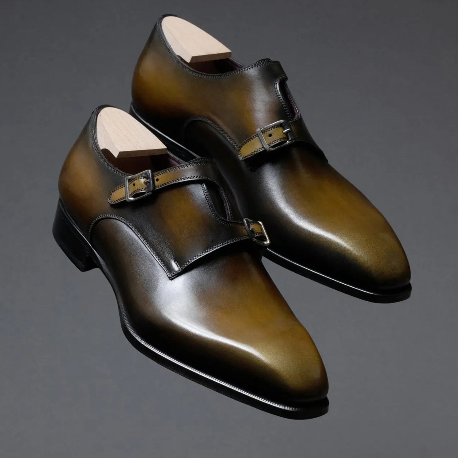 Men's olive green patina genuine leather double monk strap formal dress shoes featuring a hand-painted leather finish, square toe design, dual buckle closure, cushioned footbed, soft leather lining, and premium craftsmanship for weddings, office wear, business meetings, corporate events, and formal occasions.