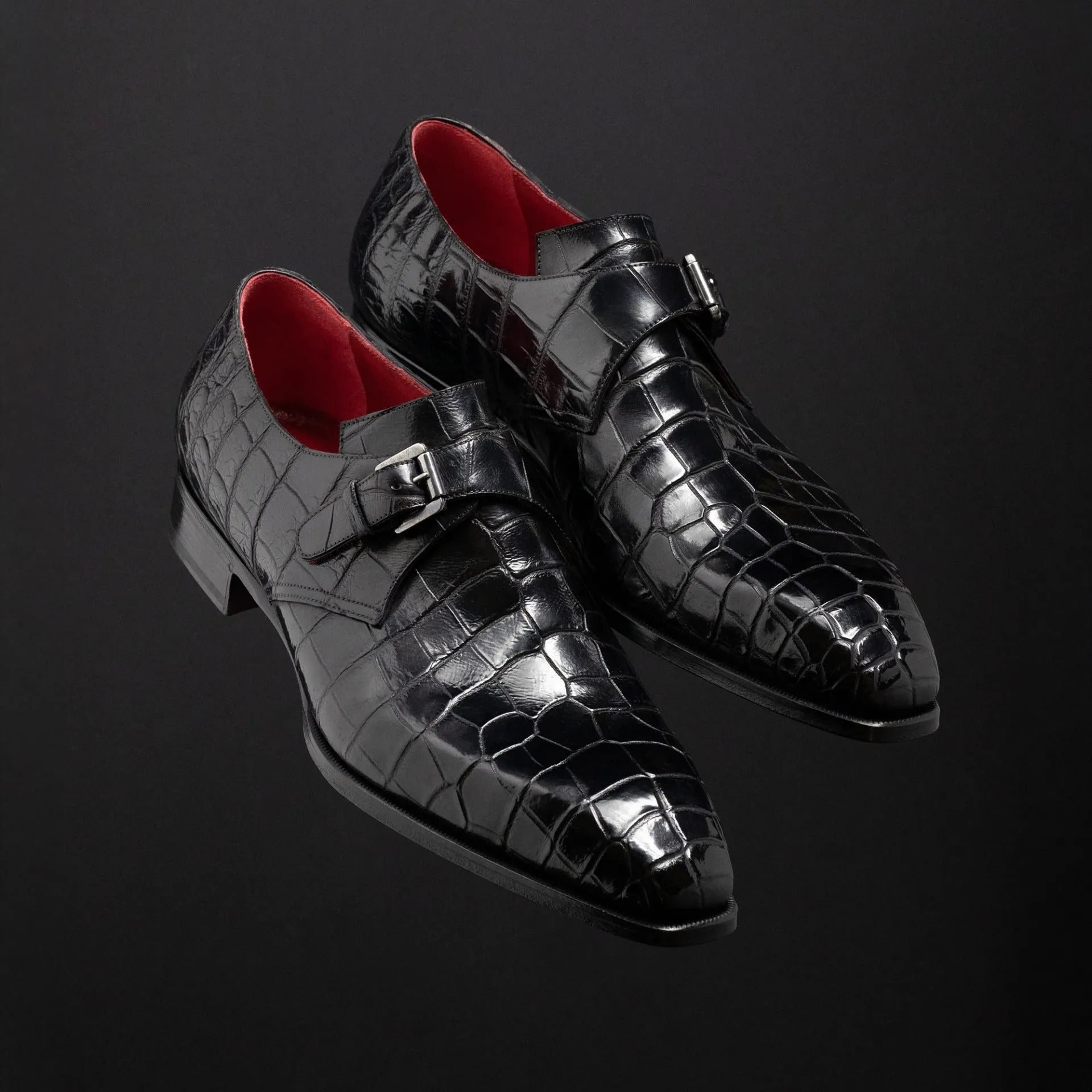 Luxury men's black crocodile embossed genuine leather double monk strap formal dress shoes featuring an almond toe, polished silver double buckle closure, glossy leather finish, cushioned footbed, and premium craftsmanship for weddings, office wear, business meetings, and formal events.