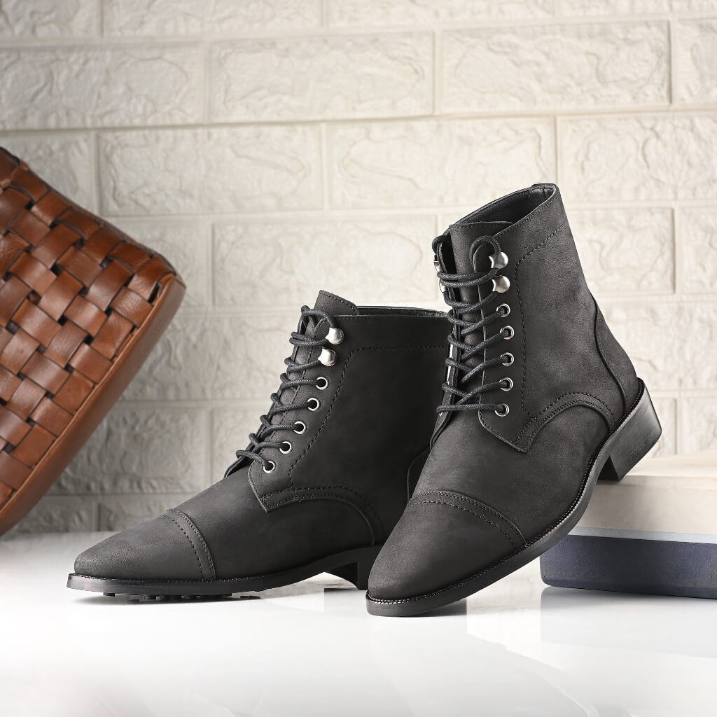 "Black Matte Welt Boots—handcrafted with durable black matte leather, Goodyear welt construction, Kevlar® blend laces, steel shanks, and studded rubber outsoles for resilience, comfort, and superior traction."





