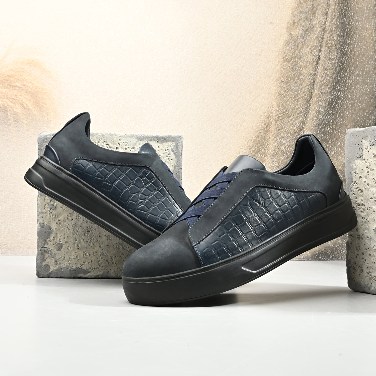 Men’s black Italian imported calf leather casual sneakers with textured side panels, memory foam cushioning and durable rubber sole.