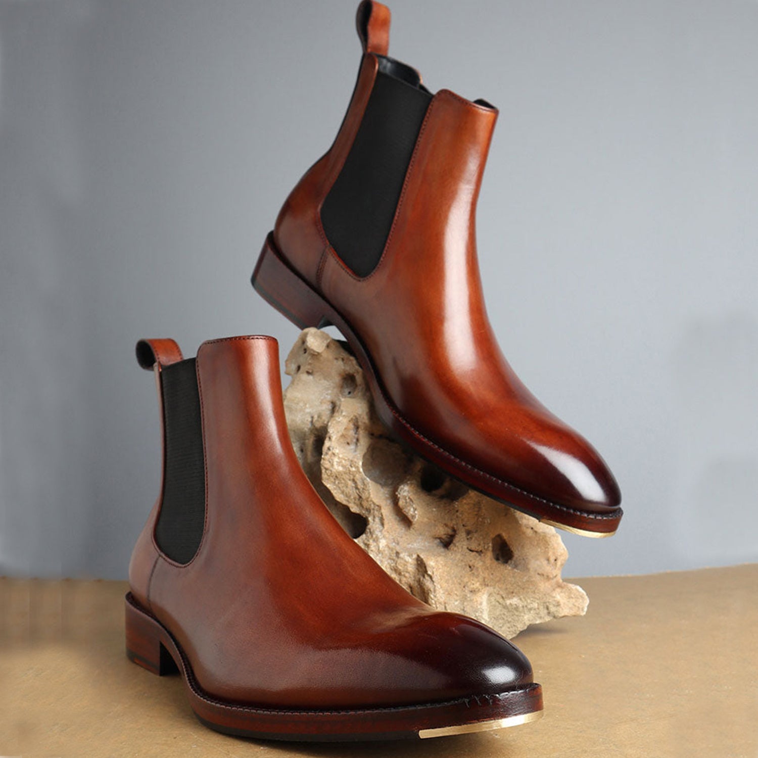 Men’s brown leather Chelsea ankle boots with elastic side panels and premium finish