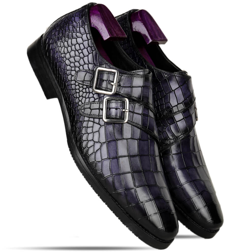 "Blue patina finish double monk strap shoes with a croco texture, premium Italian leather, cushioned footbed, and anti-skid sole for comfort and stability."

