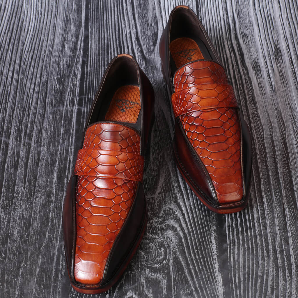 "Cognac Croco Upper Burnish Luxury Loafer by Mille Dollari, featuring crocodile-patterned leather, a rich burnished finish, and timeless sophistication."

