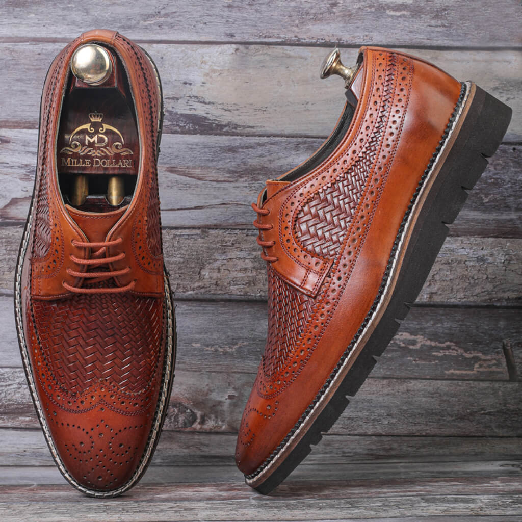 "Brown Aurora Braided Lace-up Sneakers with cemented construction, Italian rubber sole, and a stylish yet durable design for all-day comfort."

