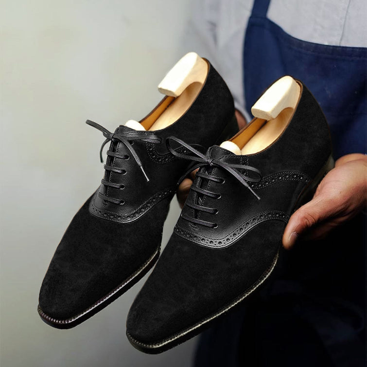 Premium men's black suede Derby shoes with soft matte texture, elegant brogue detailing, classic lace-up closure, refined cap-toe styling, and sophisticated formal design for office wear, weddings, business meetings, and special occasions.