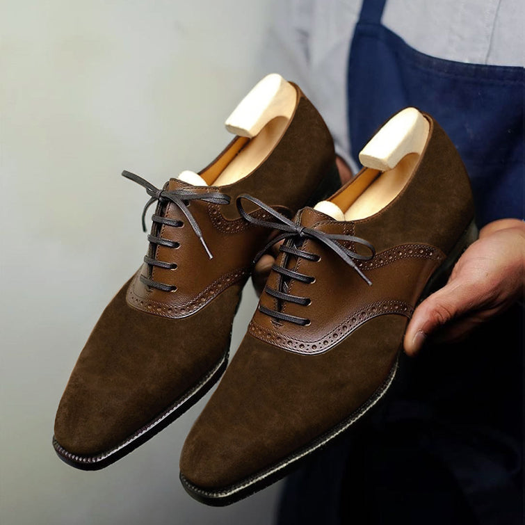 Premium men's brown suede Derby shoes with rich matte texture, elegant brogue detailing, classic lace-up closure, refined cap-toe styling, and sophisticated formal design for office wear, weddings, business meetings, and special occasions.